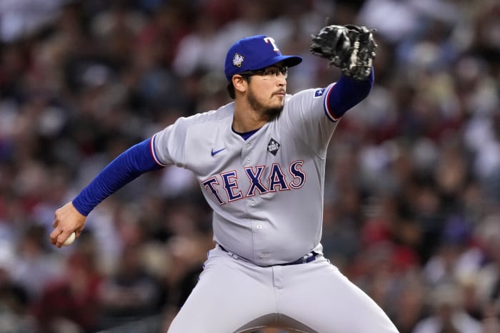 Texas Rangers relief pitcher Dane Dunning threw a scoreless sixth inning in the team's 11-7 win over the Arizona Diamondbacks Game 4 of the 2023 World Series Tuesday at Chase Field in Phoenix.
